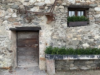 old door in stone wall