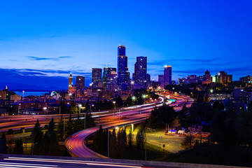 Fototapeta na wymiar View of Seattle downtown over I5 interstate highway at night from Dr. Jose Rizal Park, Washington, USA