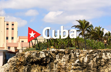 Cuba word sign with red triangle and a star, touristic landmark in Havana