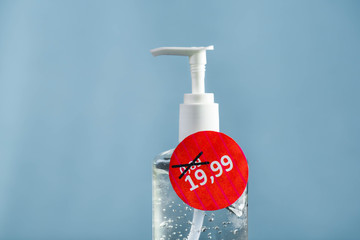 bottle of hand disinfecting gel, hand sanitizer with price changed to much higher than before....