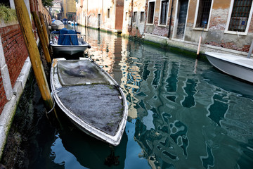 Fototapeta na wymiar gondolas on canal in venice