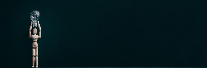 Creative imagination. Idea inspiration. Conceptual articulated man composition. Manikin with bulb.