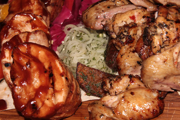 Grilled pork and chicken. Juicy chicken in pita bread. Meat Board.