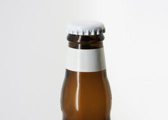 Beer Bottle Mock Up Blank Label. Beer bottle brown isolated on white background. Bottle Cap Mock Up. Close Up of a Beer bottle Cap Mockup with on white background.
