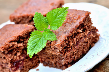 Close up of gingerbread buns with leaves of mint.