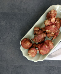 a plate full of Jerusalem artichoke,recommended foods for dieting,