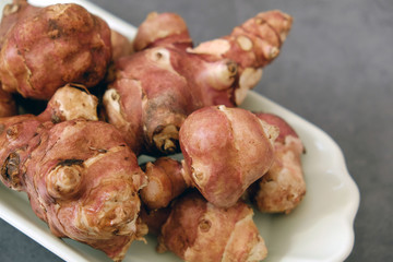 a plate full of Jerusalem artichoke.recommended foods for dieting,close up,