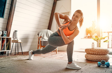 Woman doing exercises at home.
