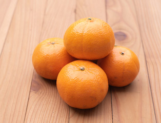orange on wood background