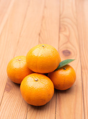 orange on wood background