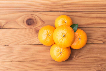 orange on wood background