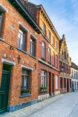 Fototapeta na wymiar Bruges, Belgium old classic houses on a quiet street.