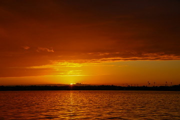 Naklejka premium Sunset and Dramatic Clouds over the St. Johns River