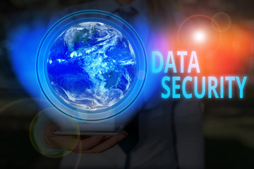 Handwriting text writing Data Security. Conceptual photo the process of protecting data from unauthorized access Elements of this image furnished by NASA