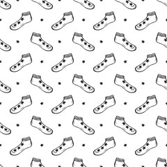 Clothes background. Socks Vector Seamless pattern. Hand drawn doodle socks. Black and white illustration
