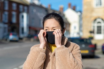 Asian women wearing face mask against coronavirus covid-19