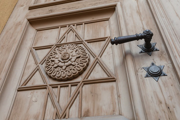 Synagogue door detail with handle and star ornament