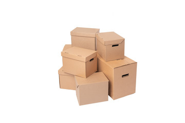 Stack of empty cardboard boxes isolated on white background closeup.