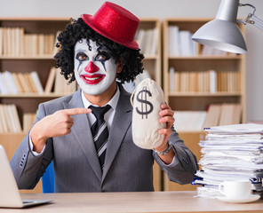 Clown businessman working in the office