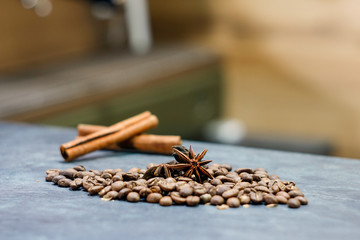 coffee beans, cinnamon sticks, star anise and dry oranges