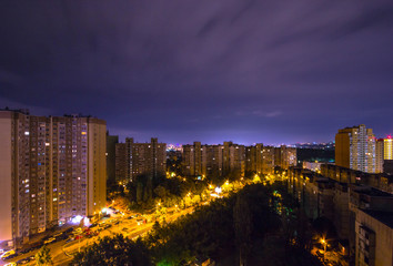 Fototapeta premium Night view of the city in the lights from a height