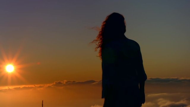 female Travels in the clouds of her dreams Golden sunset at Parque Nacional del Teide National Park tourism in Tenerife Canary islands Shot URSA 4.6K