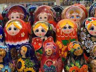 Fototapeta premium Wooden Nesting Dolls / Russian Matryoshka Dolls Souvenir Background. Toy Concept