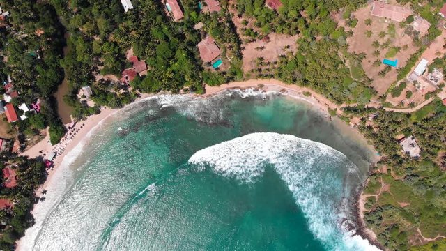 Hiriketiya tropical beach in Sri Lanka aerial footage