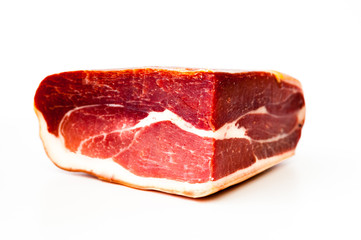 Spanish food.Serrano ham on white isolated background. Close-up
