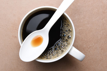 Plastic Spoon on Coffee Mug