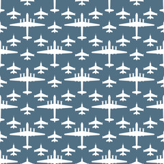 seamless pattern with silhouettes of military aircraft