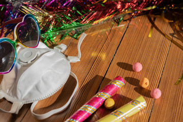 Party with mask protection in croud of people. Concept, close-up. Place for text.