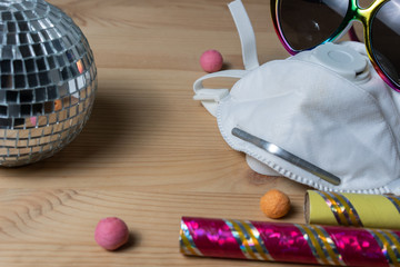 Party with mask protection in croud of people. Concept, close-up. Place for text.