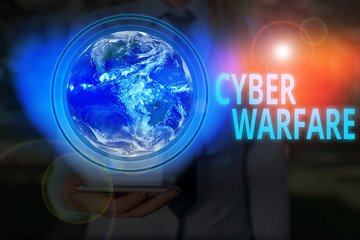 Handwriting text writing Cyber Warfare. Conceptual photo activity of using the internet to attack a country computers Elements of this image furnished by NASA