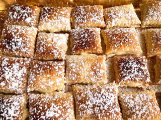 Sporcamusi, traditional fried pastries filled with cream