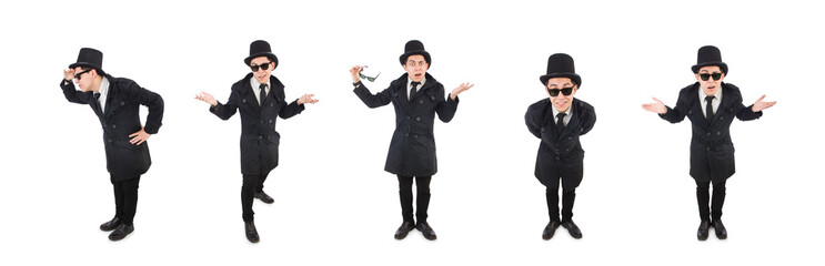 Young detective in black coat isolated on white