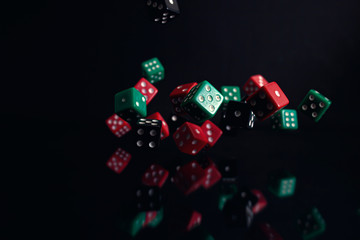 dice on a black background with reflection. Dice for the game.