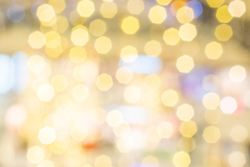 Background texture glitter. Abstract gold Festive lights. Blur Bokeh glamor.