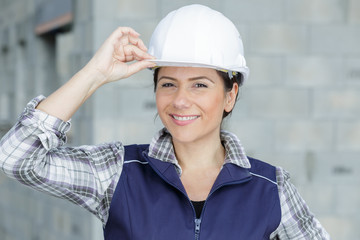 portrait of a confident female architect or engineer outdoors