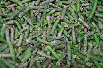 Frozen semi-finished products - "string beans". Products are scattered in the refrigerator