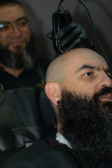 Latin American barber working the style with a long beard in the city of Bogotá.