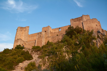 Fototapeta na wymiar Majestic castle guarding the great mountain