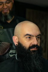 Latin American barber working the style with a long beard in the city of Bogotá.