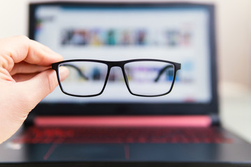 computer use with glasses for eye health, concept image
