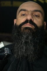 Latin American barber working the style with a long beard in the city of Bogotá.