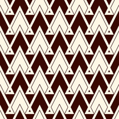 Ethnic style seamless pattern with repeated triangles. Zigzag lines motif. Tribal geometric ornament.