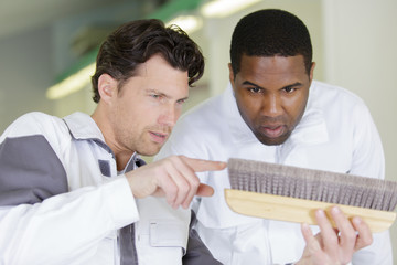 concentrate male apprentice with experimented mentor