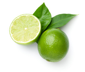 Limes With Leaves Isolated On White Background