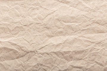 Crumpled paper background texture. Brown paper background