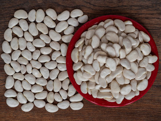 White Lima beans on wood